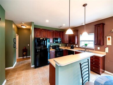Large Kitchen with 42inch Cherry Cabinets.