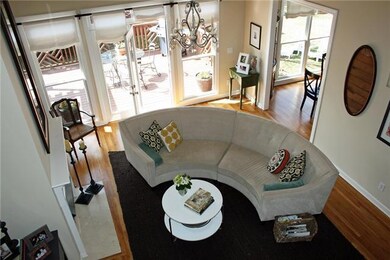 Soaring ceiling and hardwoods in great room
