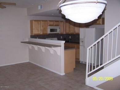 KITCHEN, PARTIAL DINING ROOM