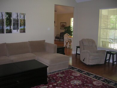 Vaulted ceiling   Ceiling fan   Great view of back