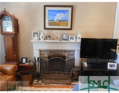 Living Room. Wood Burning Fireplace with Re-Built 