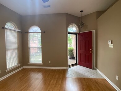 Great Room w/ lots of windows and glass storm fron