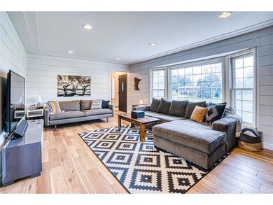 Beautiful living room with new engineered hardwood