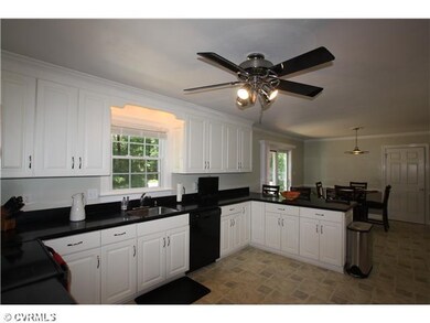 Kitchen - Updated color scheme. The door in the ba