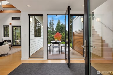 The entryway sets the tone with a nice flow to the garden deck. The living room, dining room and kitchen are to the left. The bedroom wing is to the right.