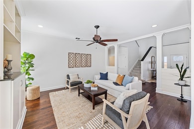 Living space open to kitchen and front entry