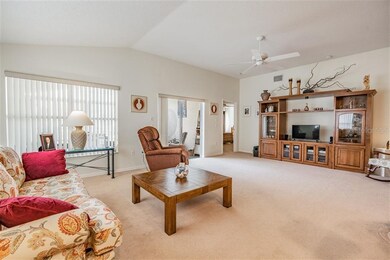 Vaulted ceiling with slider to enclosed patio