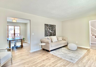 A view heading into the formal dining room from the living room