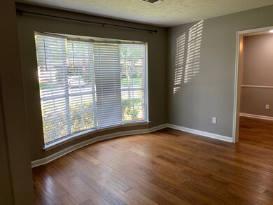 Beautiful bay windows in the formal living area.