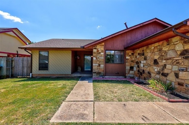 View of front of house with a front yard and plenty of space for landscaping