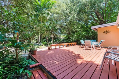 Back yard with large wood deck