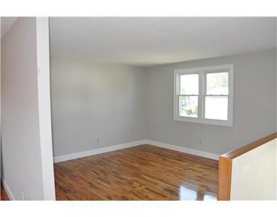 Living Room. LIVING ROOM WITH GLEAMING HARDWOOD FL