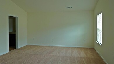 Master Bedroom has VAULTED ceiling and en suite DELUXE bath! (Double sinks, sep shower, garden soaking tub) Come home to relax!