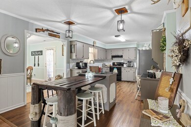 Kitchen featuring dark hardwood / wood-style floor