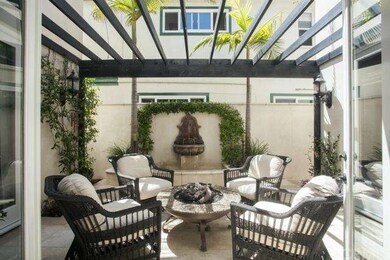 Sunny south facing patio with beautiful water wall