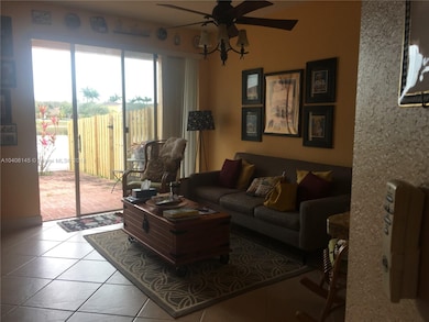 Family room with sliding door to the patio overloo