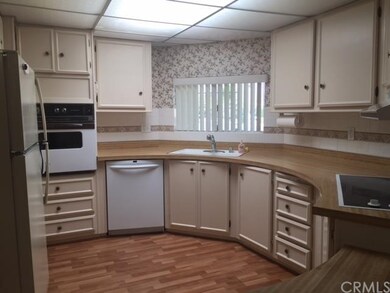 efficient kitchen, lots of drawers, pantry beside 