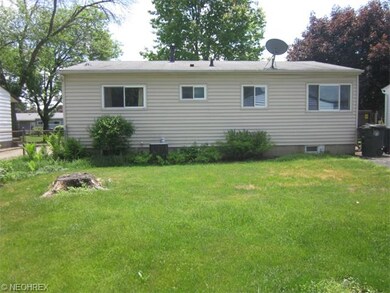 Vinyl sided home. View from backyard. Central air 