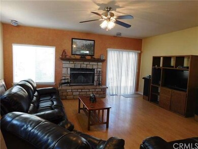 Living/Great room with laminate floors and custom 