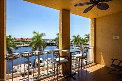 Balcony with ceiling fan and a water view