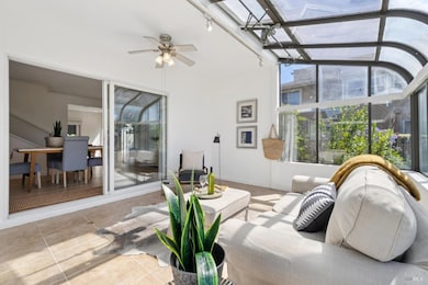 Right off the dining room, this bright and inviting solarium is perfect for seasonal enjoyment, offering a sun-drenched space ideal for extended hobbies, reading, art or gardening.  Surrounded by natural light and tranquil water views, it creates an 