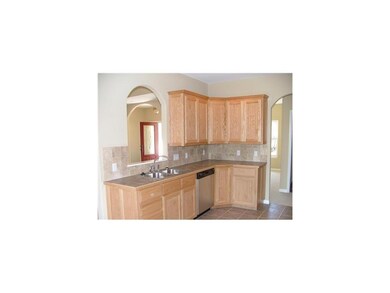 Kitchen with pass-thru to livingroom