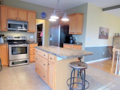Large, eat-in kitchen with ceramic tile flooring, 