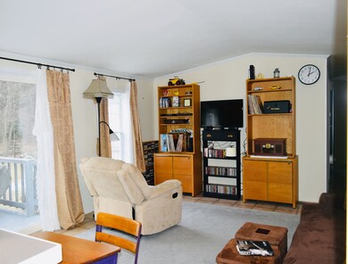 Spacious living area with sliders to deck