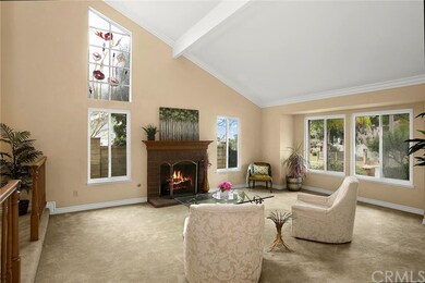 High vaulted ceilings and a welcoming formal livin