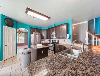 Large kitchen looking at the formal dining