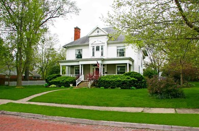 A peak of the historic brick street this home is l