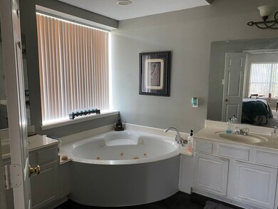 Corner jetted tub in Master Bath.