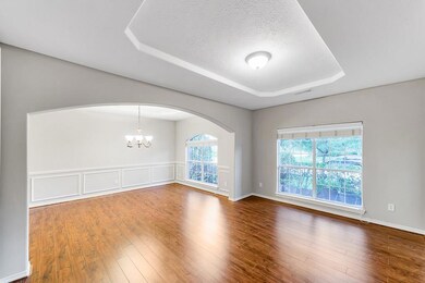 FORMAL LIVING AND DINING ROOMS - this entertaining space looks onto the front yard and opens to the foyer and kitchen. The living room measures 16x11.