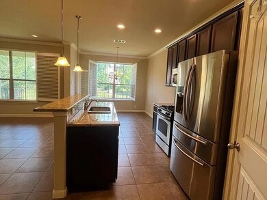 Kitchen with ornamental molding, dark brown cabin