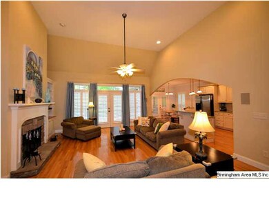 Notice the custom plantation shutters and the two 