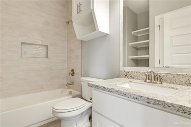 Full bathroom featuring vanity and shower / washtub combination