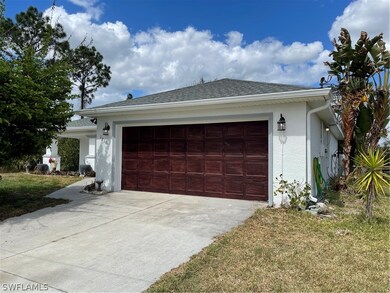 1211 Antonio St E, Lehigh Acres, FL 33974 - photo 3