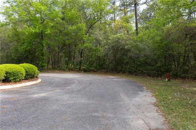 View of street with a wooded view