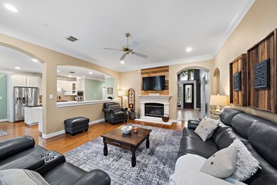 The spacious and seamless flow from living room to the kitchen is perfect for entertaining.