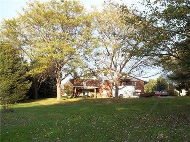 Exterior Back. BEAUTIFULLY LANDSCAPED GROUNDS.