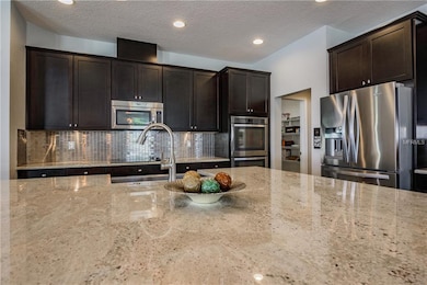 Stainless steel appliances with apron sink. Walk i