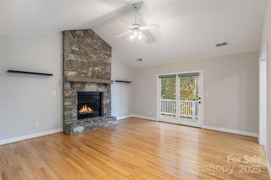 Native stone fireplace and cathedral ceiling