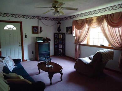 Living Room. Doorway to 13x9 side porch.