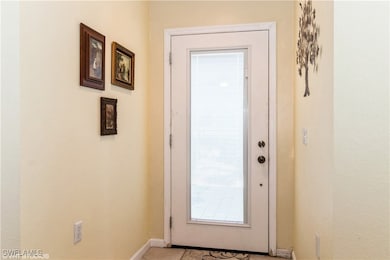 Entryway with baseboards