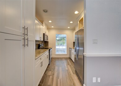 9809 Richmond Ave unit 5, Houston, TX 77042 - photo 7