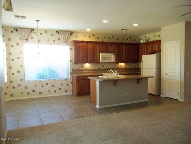 Kitchen opens to family room.