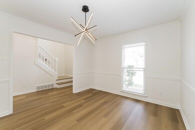 Empty room featuring hardwood / wood-style floors,