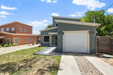 View of front of home featuring a front yard, boa