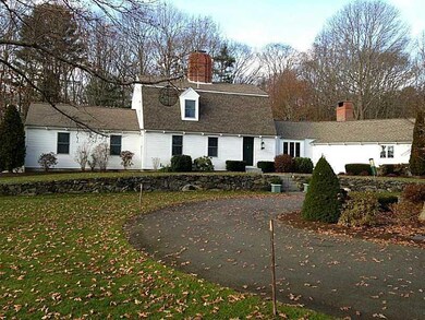 Exterior Front. Paved Circular Driveway