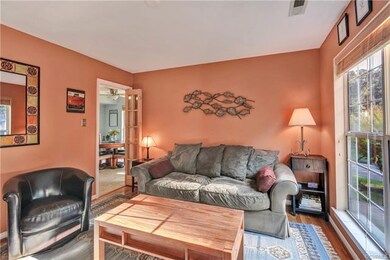 Formal Dining Room is currently used as a Den